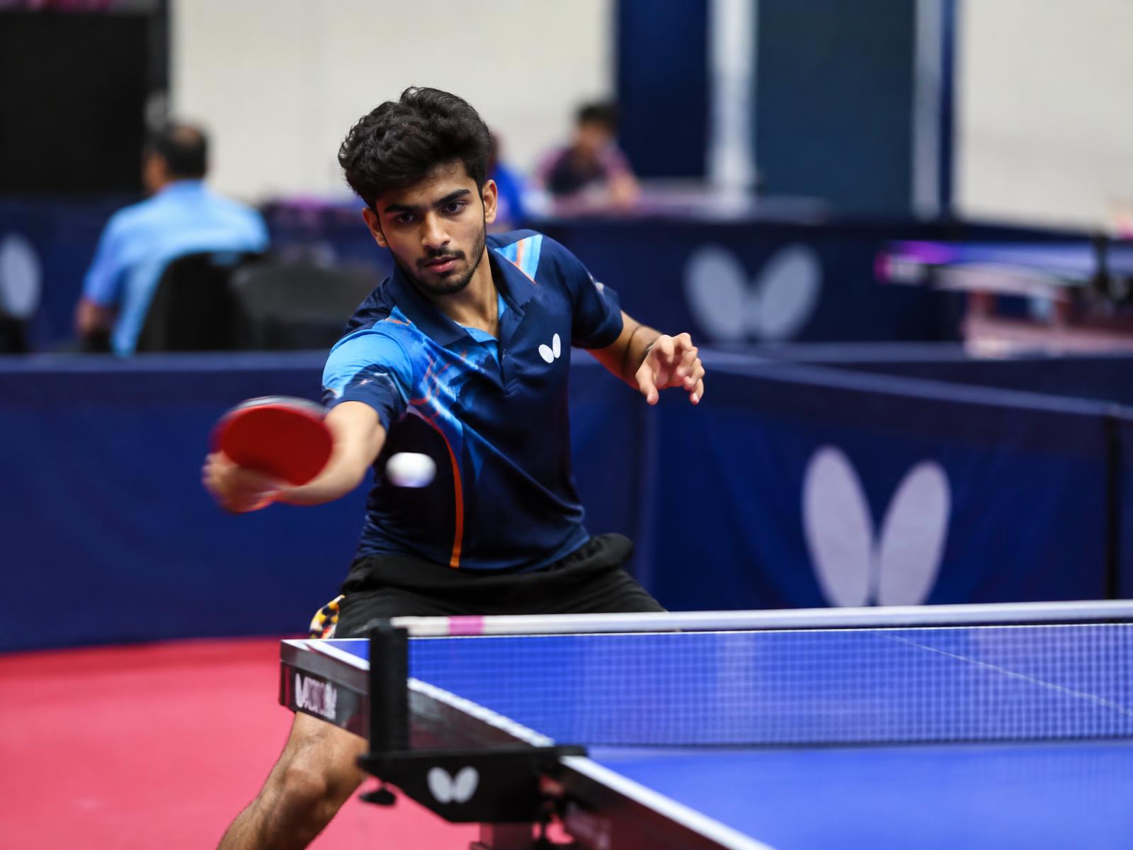 Table tennis match in progress